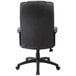 A Boss B7901 black executive high back chair with arms and wheels.