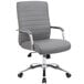 a grey office chair with chrome arms