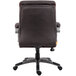 The back of a brown leather Boss mid back executive chair.