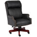 A Boss black leather office chair with a mahogany base.