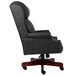 A black leather office chair with mahogany base.