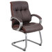 A brown leather Boss office chair with metal legs.