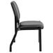 A Boss black antimicrobial armless guest chair with a black cushion.
