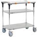 A Metro PrepMate MultiStation, a three tiered metal cart with wheels and a cutting board.