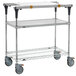 A silver metal Metro PrepMate MultiStation cart with black wheels.