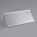 A clear plastic container with a white cover.