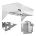 A commercial kitchen hood system package with a stainless steel hood, a makeup air unit, and an exhaust fan.