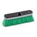 A green and black Carlisle Flo Thru vehicle cleaning brush.