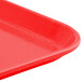 a red tray with a corner