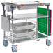 A silver metal Metro PrepMate MultiStation cart with galvanized shelves and trays.