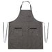 a gray apron with black straps