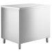 A Regency stainless steel enclosed base table with sliding doors and a midshelf.