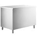 A white rectangular object with stainless steel legs and a silver top.