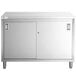 A Regency stainless steel enclosed table with sliding doors.
