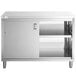 A Regency stainless steel cabinet with sliding doors and a midshelf.