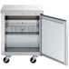 An Avantco stainless steel undercounter freezer with a door open.