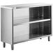 A Regency stainless steel dish cabinet on a counter in a school kitchen with adjustable shelves.