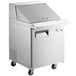 An Avantco stainless steel sandwich prep table with a door over a white background.