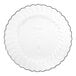 A clear plastic plate with a scalloped edge.