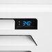 A Beverage-Air MarketMax glass door freezer with a digital display on a white surface.