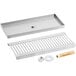 A Regency stainless steel surface mount beer drip tray with a metal drain and nut.