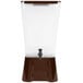 A Tablecraft brown and white plastic beverage dispenser.