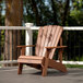 A brown Lifetime Adirondack chair on a wooden deck.