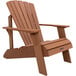 A brown wooden Adirondack chair with armrests.