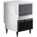 A white rectangular Hoshizaki undercounter ice machine with a black square bin on top.