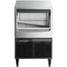 A silver and black Hoshizaki undercounter ice machine.