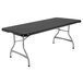 A black folding table with silver legs.