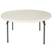 A Lifetime almond plastic round table with black legs.