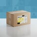 A brown cardboard box of Adourne Fine Yellow Sanding Sugar with a white label.