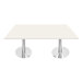 A rectangular white Art Marble Furniture table with silver metal legs.