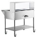 A stainless steel ServIt mobile electric steam table with sneeze guard.