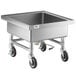 A large stainless steel Regency silverware soaking sink with black wheels.