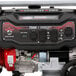 A Simpson portable generator with a red and black engine.