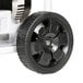 A black wheel on a white Simpson Portable Generator.