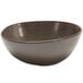 A close-up of a Front of the House Kiln mocha bowl with a white background and dark brown rim.
