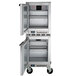 A Beverage-Air stainless steel undercounter freezer with two left hinged doors open.