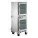 A Beverage-Air stainless steel undercounter refrigerator with glass doors on wheels.