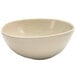 A white bowl with specks.