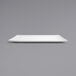 A white rectangular Front of the House Spiral porcelain plate on a grey background.