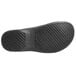 The black sole of a Genuine Grip black shoe.