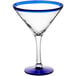 a clear glass with a blue rim