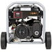 A Simpson portable generator with a black engine and wheels.