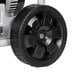 A black wheel on a white Simpson portable generator.