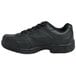 A pair of black Genuine Grip steel toe jogger shoes for women with laces.