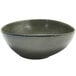 A Front of the House Kiln porcelain bowl with a white background and dark gray rim.