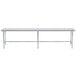 An Advance Tabco stainless steel open base work table with metal legs.